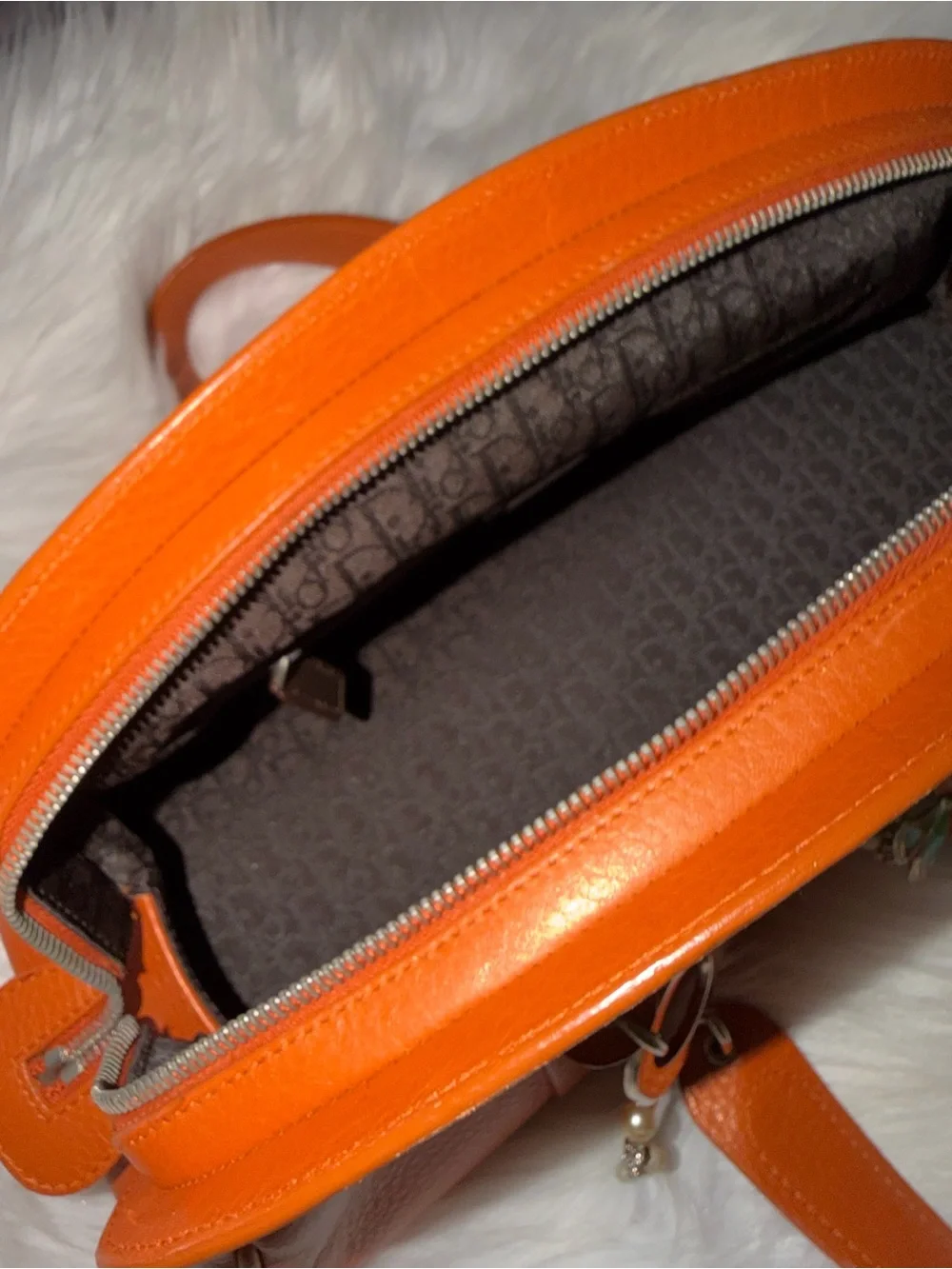 Dior Limited Edition Orange Leather Top-Handle Bag.